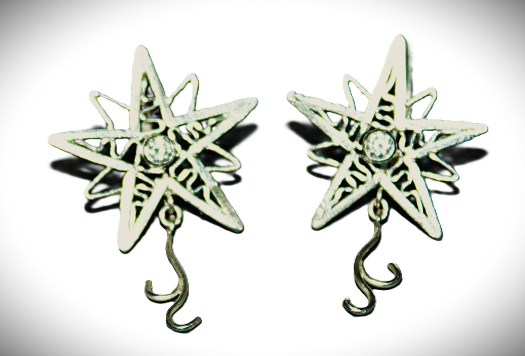 Diamond earrings,14-karat gold, natural star-shaped diamonds. An original piece of jewelry.